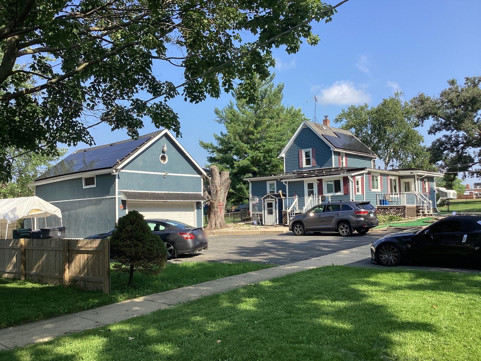 Solar panels on a house and its detached garage
